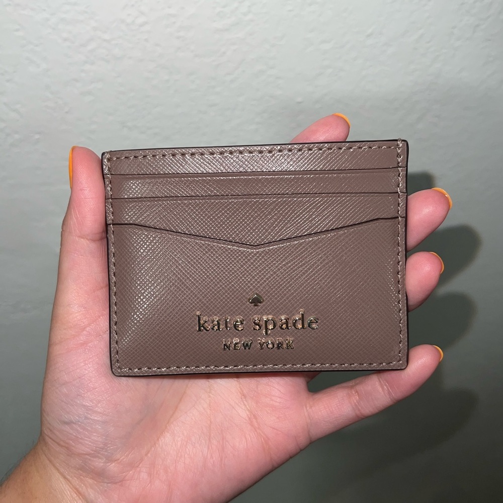 kate spade taupe card holder with gold logo